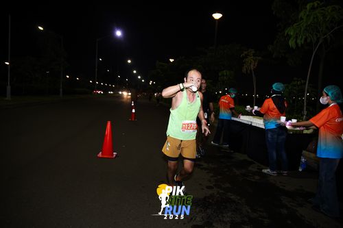 Race photo from PIK NITE RUN 2025