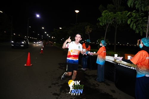 Race photo from PIK NITE RUN 2025