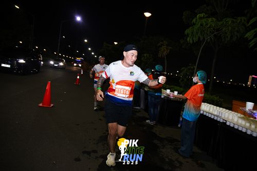Race photo from PIK NITE RUN 2025
