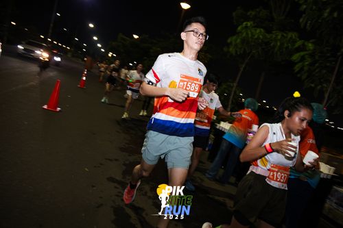 Race photo from PIK NITE RUN 2025