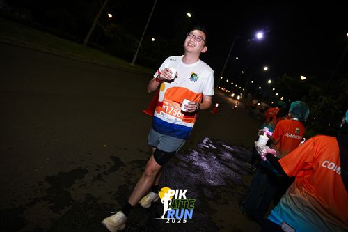 Race photo from PIK NITE RUN 2025