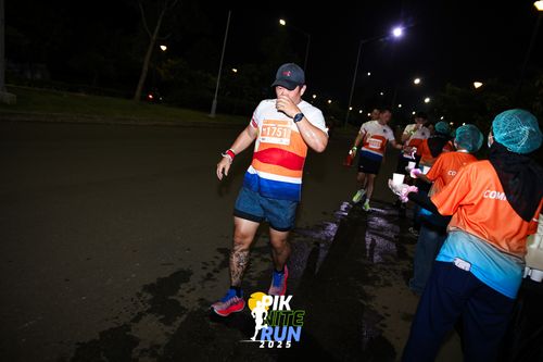 Race photo from PIK NITE RUN 2025
