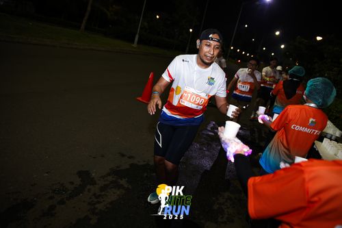 Race photo from PIK NITE RUN 2025