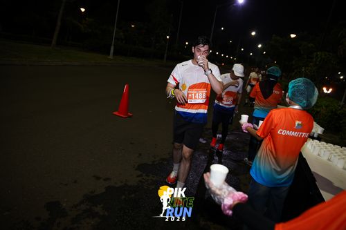 Race photo from PIK NITE RUN 2025