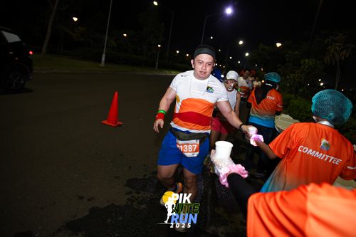 Race photo from PIK NITE RUN 2025