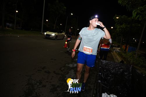 Race photo from PIK NITE RUN 2025