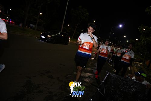 Race photo from PIK NITE RUN 2025