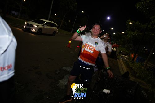 Race photo from PIK NITE RUN 2025