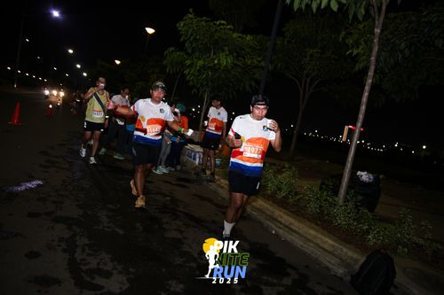 Race photo from PIK NITE RUN 2025