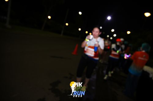 Race photo from PIK NITE RUN 2025