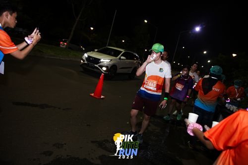 Race photo from PIK NITE RUN 2025