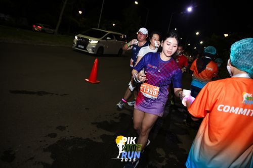 Race photo from PIK NITE RUN 2025