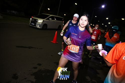 Race photo from PIK NITE RUN 2025
