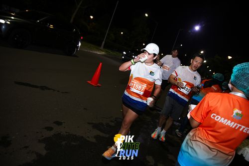 Race photo from PIK NITE RUN 2025