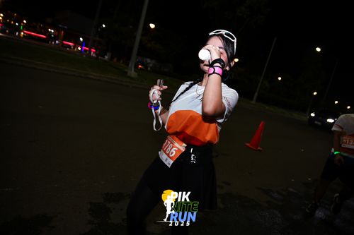 Race photo from PIK NITE RUN 2025