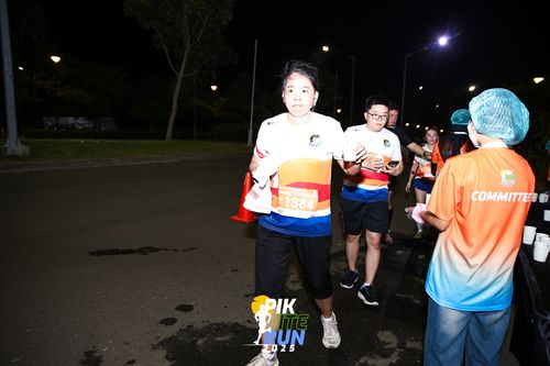 Race photo from PIK NITE RUN 2025