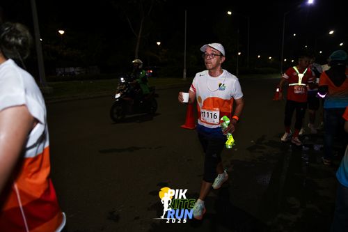 Race photo from PIK NITE RUN 2025