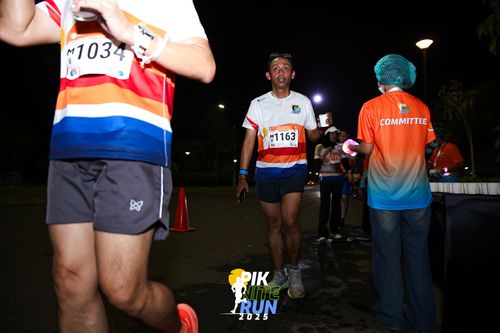 Race photo from PIK NITE RUN 2025