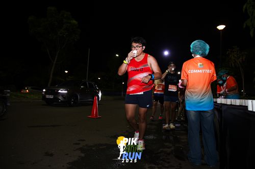Race photo from PIK NITE RUN 2025