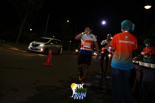 Race photo from PIK NITE RUN 2025