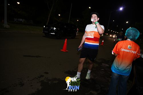 Race photo from PIK NITE RUN 2025