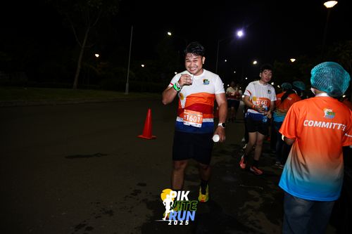 Race photo from PIK NITE RUN 2025