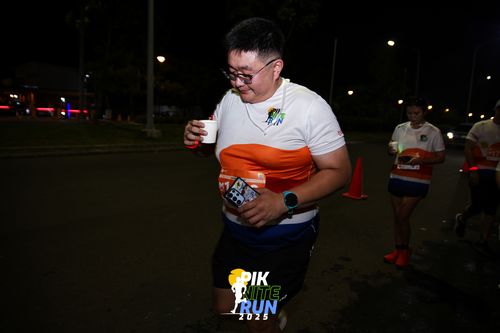 Race photo from PIK NITE RUN 2025