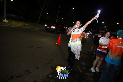 Race photo from PIK NITE RUN 2025