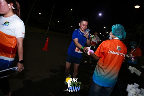 Race photo from PIK NITE RUN 2025