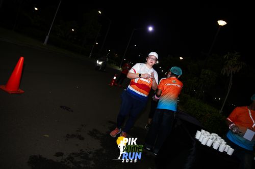 Race photo from PIK NITE RUN 2025