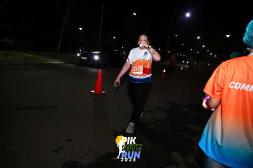 Race photo from PIK NITE RUN 2025