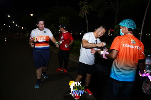Race photo from PIK NITE RUN 2025
