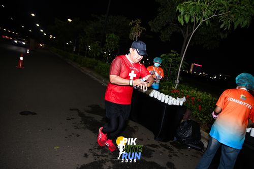 Race photo from PIK NITE RUN 2025