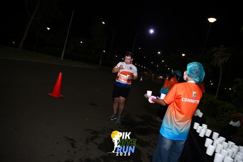 Race photo from PIK NITE RUN 2025