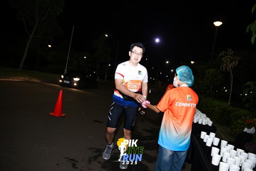 Race photo from PIK NITE RUN 2025