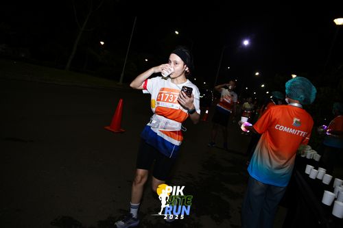 Race photo from PIK NITE RUN 2025