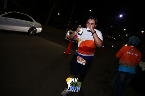 Race photo from PIK NITE RUN 2025