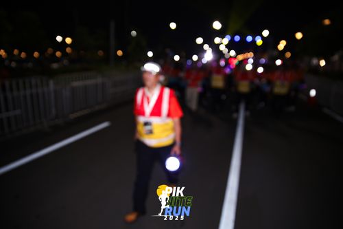 Race photo from PIK NITE RUN 2025