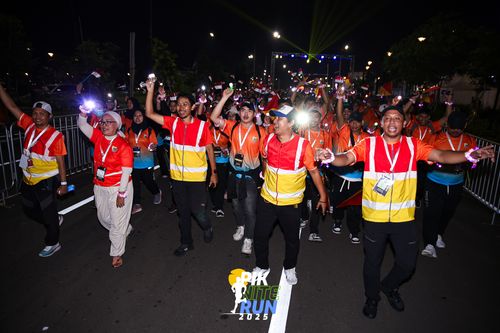 Race photo from PIK NITE RUN 2025