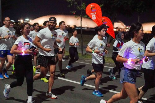 Race photo from PIK NITE RUN VIBES