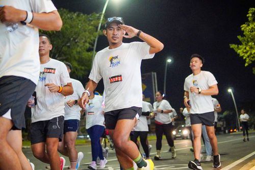 Race photo from PIK NITE RUN VIBES