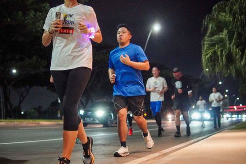 Race photo from PIK NITE RUN VIBES