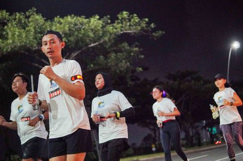 Race photo from PIK NITE RUN VIBES