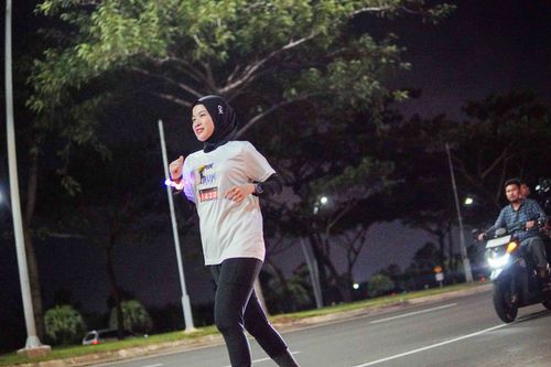 Race photo from PIK NITE RUN VIBES