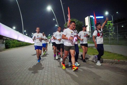 Race photo from PIK NITE RUN VIBES