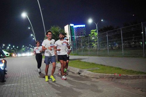 Race photo from PIK NITE RUN VIBES