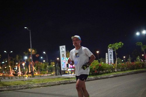Race photo from PIK NITE RUN VIBES