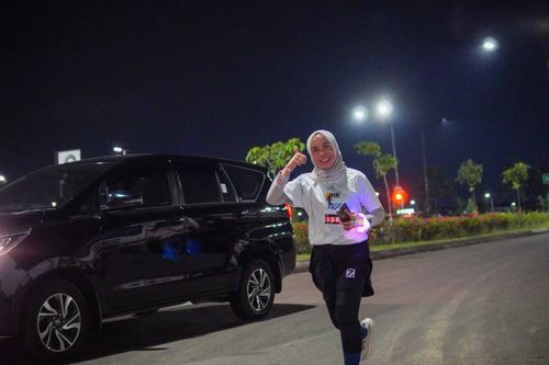 Race photo from PIK NITE RUN VIBES