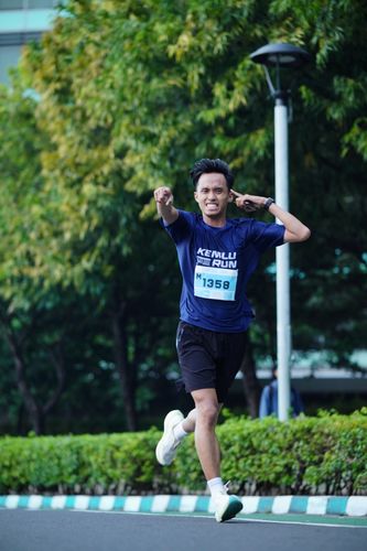 Race photo from KEMLU RUN 2025