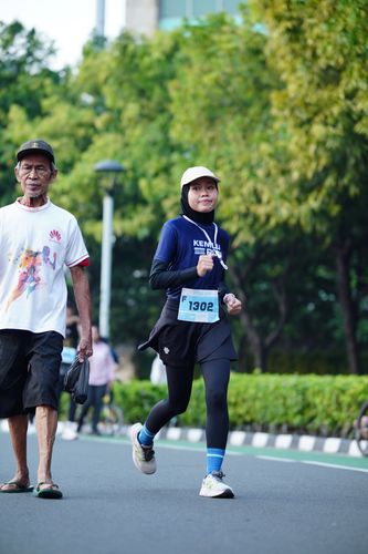 Race photo from KEMLU RUN 2025